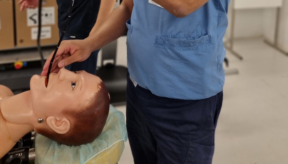 Close-up of training dummy with tube inserted into mouth